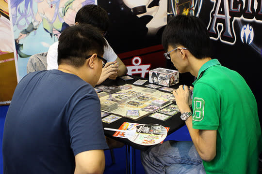 Gamers playing the ‘Ascendants of Aetheros’ card game (Photo: Sharlene Sankaran/Yahoo Singapore)