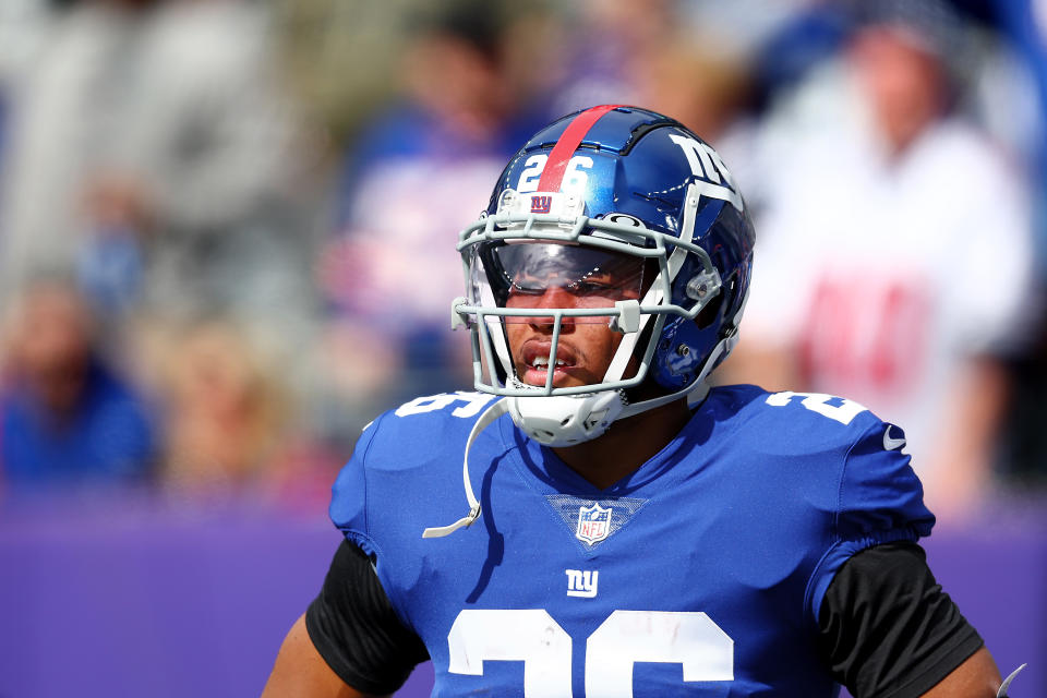 Saquon Barkley's savvy clock management secured the Giants' fifth win of the year. (Photo by Elsa/Getty Images)