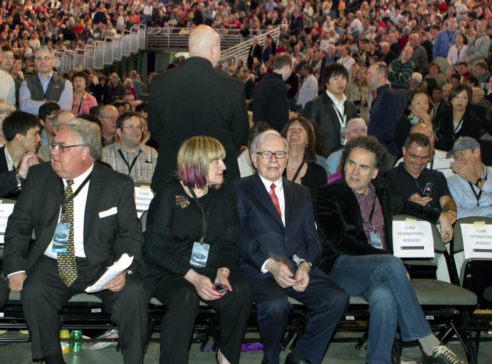 Warren Buffett with his children, from left to right, Howard, Susan, and Peter.