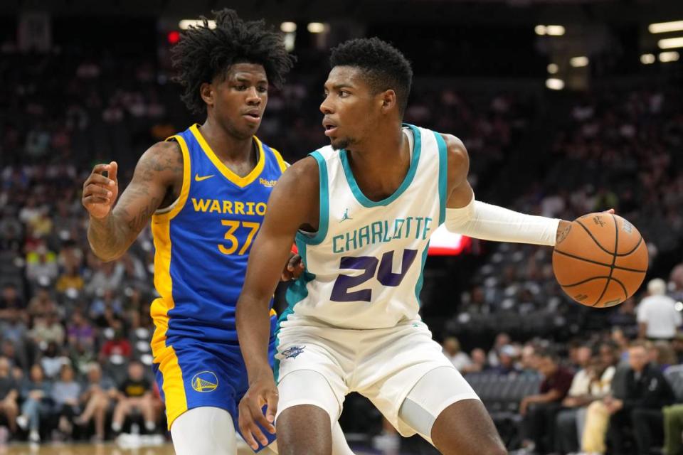 Charlotte Hornets forward Brandon Miller dribbles against Golden State Warriors guard Kendric Davis during a summer league game in Sacramento, California. (Darren Yamashita-USA TODAY Sports)