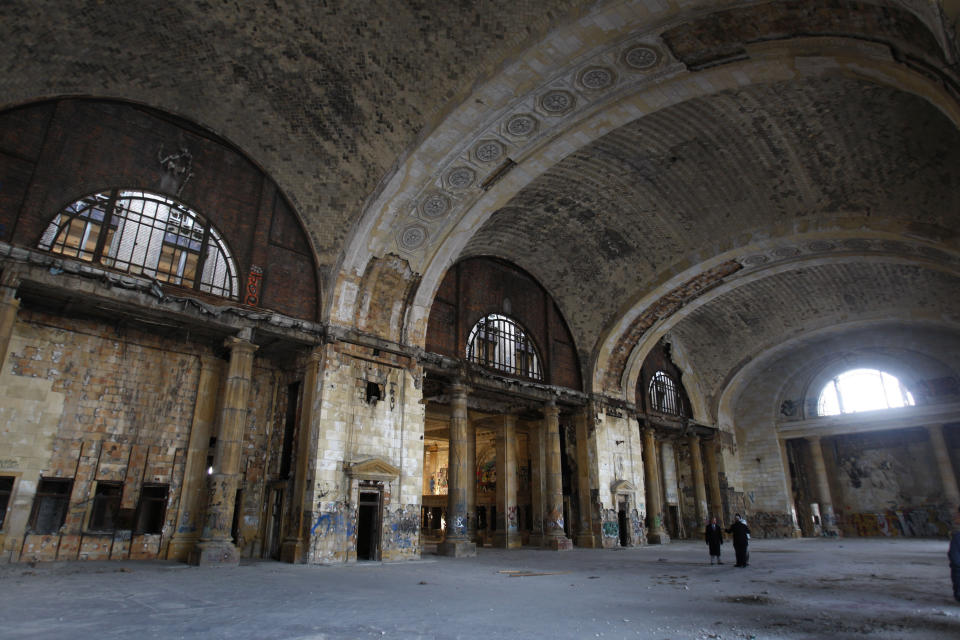 FILE- The interior of the Michigan Central Station is seen, Thursday, Jan. 21, 2010 in Detroit. A once hulking scavenger-ravaged monolith that symbolized Detroit's decline reopens this week after a massive six-year multimillion dollar renovation by Ford Motor Co., which restored the Michigan Central Station to its past grandeur with a focus squarely on the future of mobility. (AP Photo/Carlos Osorio_File)