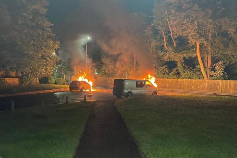 Vehicles on fire outside Stour Walk in Wimborne &lt;i&gt;(Image: Chloe Torring)&lt;/i&gt;