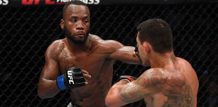 Leon Edwards punches Rafael dos Anjos at UFC on ESPN 4