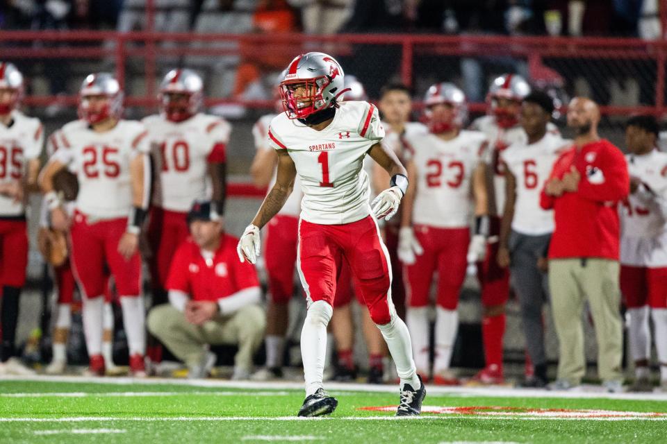 Saraland's wide receiver Ryan a. Williams (1) walks onto the field during the second round of the high school football playoffs Friday, Nov. 11, 2022 at Hillcrest High School.