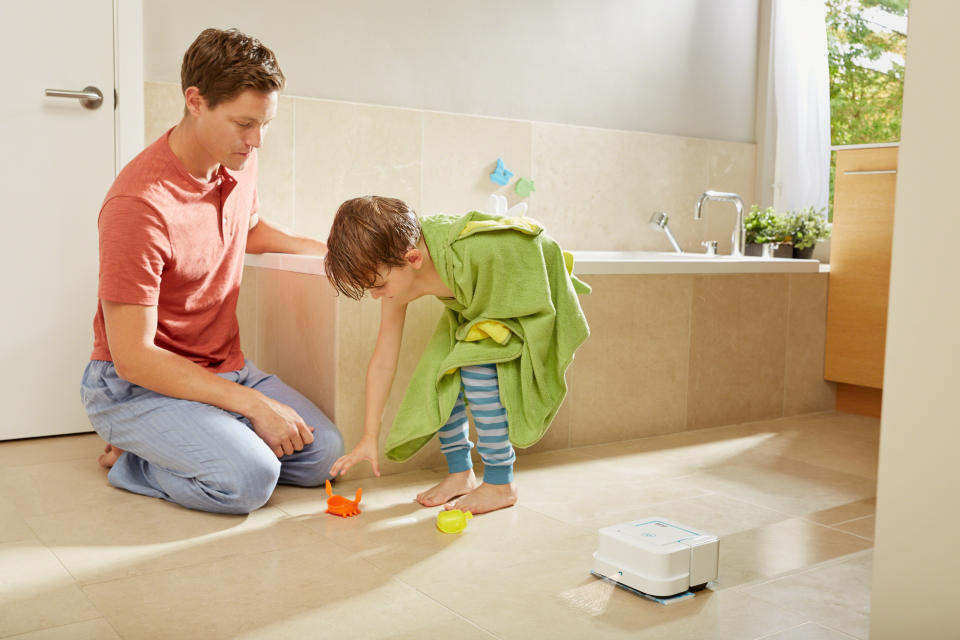 Bathroom with Braava robot mopping the floor