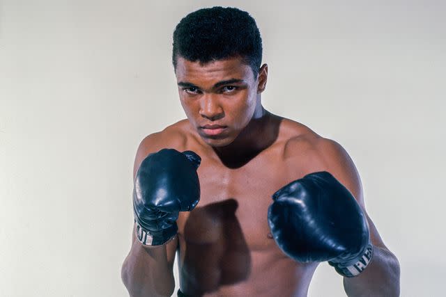<p>Stanley Weston/Getty</p> Cassius Clay (Muhammad Ali) 20 year old heavyweight contender from Louisville, Kentucky poses for the camera on May 17, 1962, in Bronx, New York.