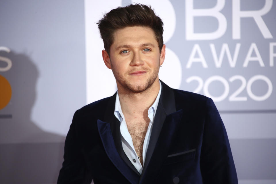 Niall Horan poses for photographers upon arrival at the Brit Awards 2020 in London, Tuesday, Feb. 18, 2020. (Photo by Joel C Ryan/Invision/AP)