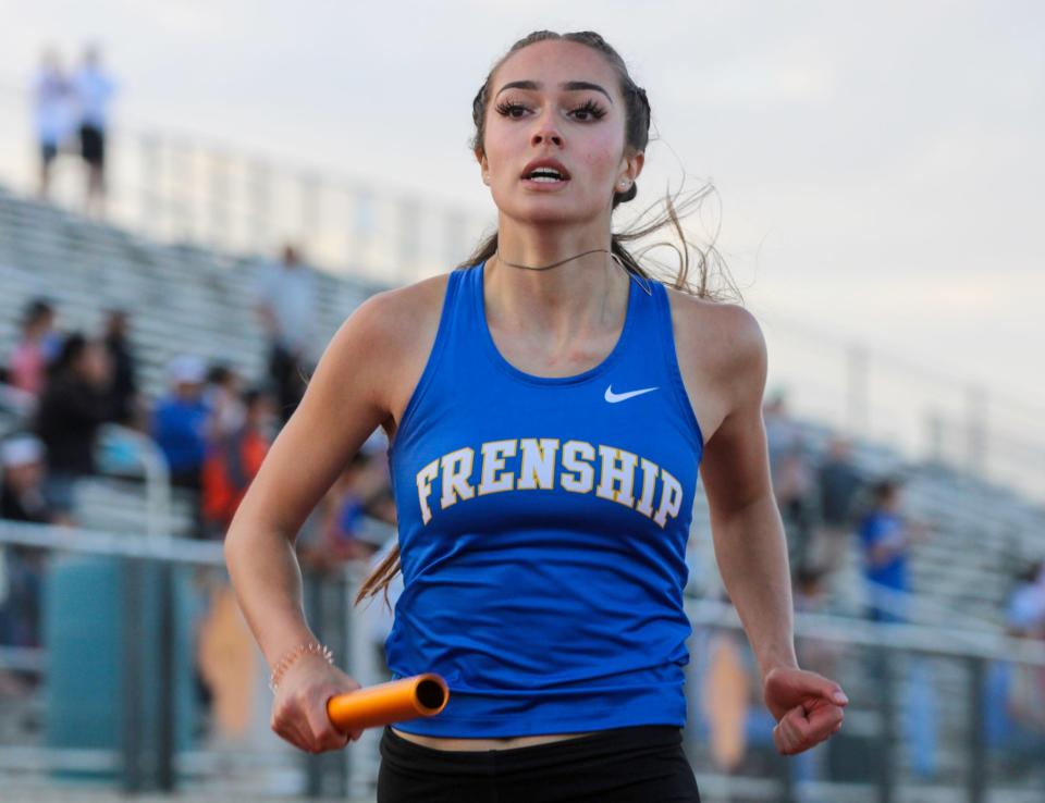 Frenship's Devin Moore anchors the winning 1,600 relay team during the District 2-6A track and field meet on Thursday, April 13, 2023 at Peoples Bank Stadium in Wolfforth.