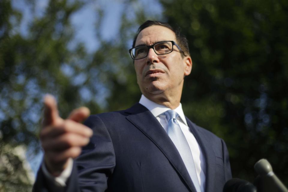 Treasury Secretary Steve Mnuchin speaks to members of the media at the White House in Washington, Wednesday, July 24, 2019. (AP Photo/Pablo Martinez Monsivais)