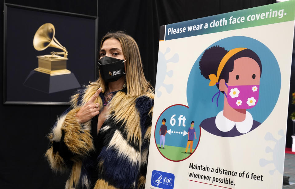 Associated Press entertainment reporter Marcela Isaza poses backstage at the 63rd Grammy Awards at the Los Angeles Convention Center, Thursday, March 11, 2021. The awards show will air on Sunday. (AP Photo/Chris Pizzello)