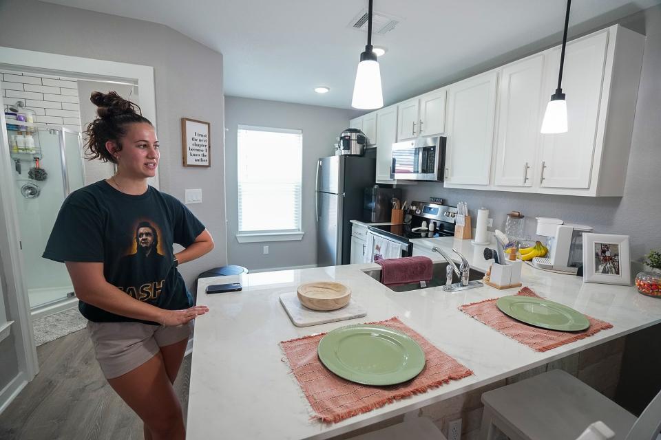 Faith Chavez, a 19-year-old college student, said she enjoys living in the first tiny home village in Round Rock and having neighbors nearby.