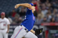 Texas Rangers starting pitcher Glenn Otto throws to a Los Angeles Angels batter during the first inning of a baseball game in Anaheim, Calif., Friday, Sept. 30, 2022. (AP Photo/Alex Gallardo)