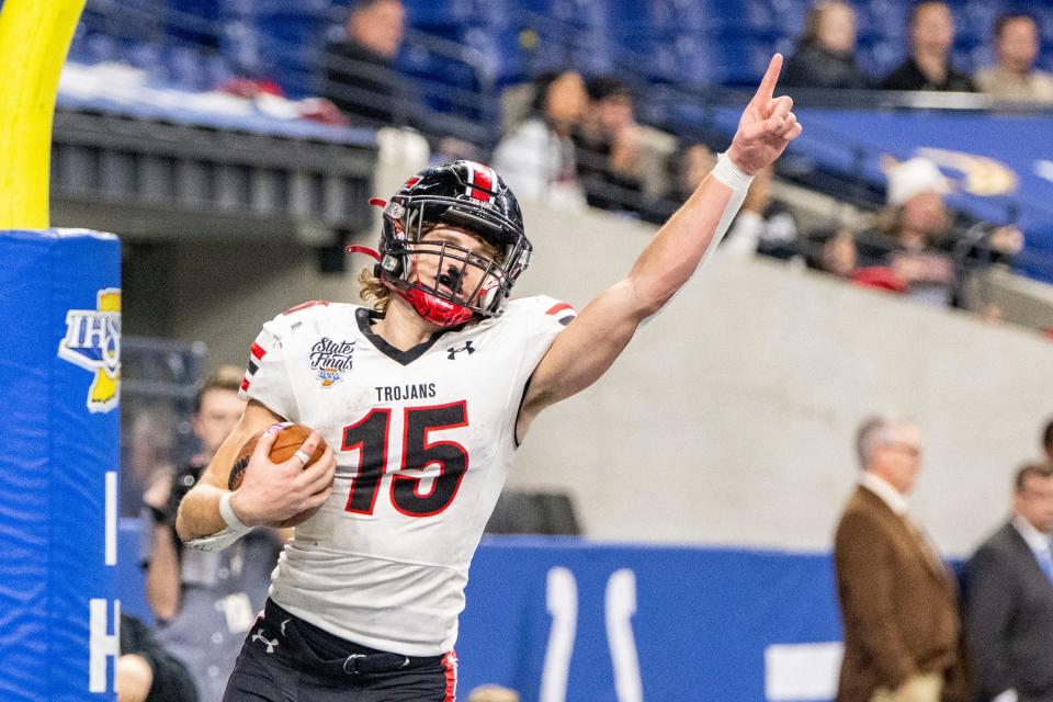 East Central High School senior Josh Ringer (15) reacts after scoring a touchdown during the second half of an IHSAA Class 4A State Championship football game against NorthWood High School, Saturday, Nov. 25, 2023, at Lucas Oil Stadium, in Indianapolis. East Central High School won, 42-14.