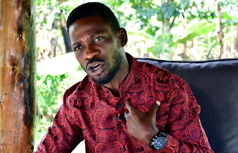 FILE PHOTO: Ugandan opposition presidential candidate Robert Kyagulanyi, also known as Bobi Wine, talks during an interview with Reuters at his home in Magere