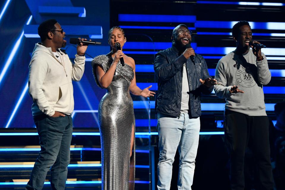 Boyz II Men join Alicia Keys to sing a tribute to Kobe Bryant at the start of the 62nd annual GRAMMY Awards.