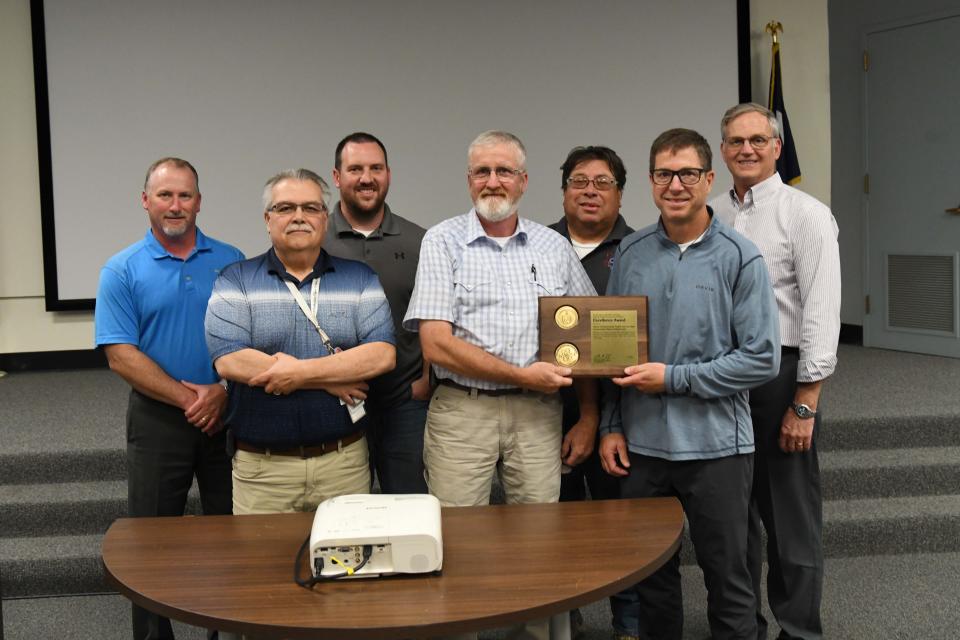 This Pantex High Explosives Science and Engineering project team relocated 15,000 cubic yards of excess soil on site, saving fuel and carbon dioxide emissions. The NA-90 Excellence Awards presentations were held Wednesday, May 24.