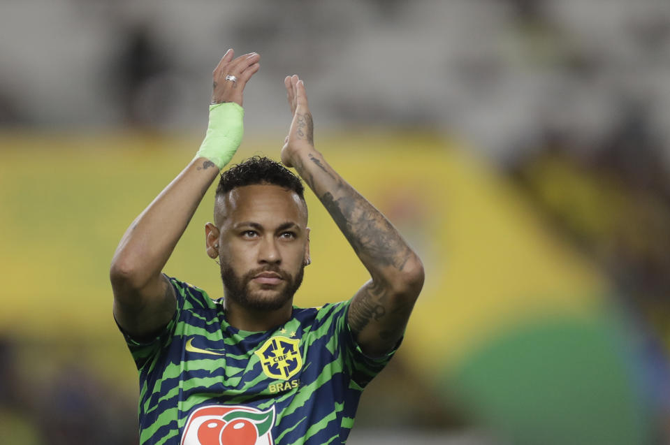 FILE - Brazil's Neymar greets fans prior a qualifying soccer match against Bolivia for the FIFA World Cup 2026 at Mangueirao stadium in Belem, Brazil, Friday, Sept. 8, 2023. Cristiano Ronaldo, Neymar and Karim Benzema have won a combined total of 11 UEFA Champions League titles and, starting Monday, Sept. 18, 2023, they lead the Saudi Arabian challenge in the Asian edition.(AP Photo/Bruna Prado, File)