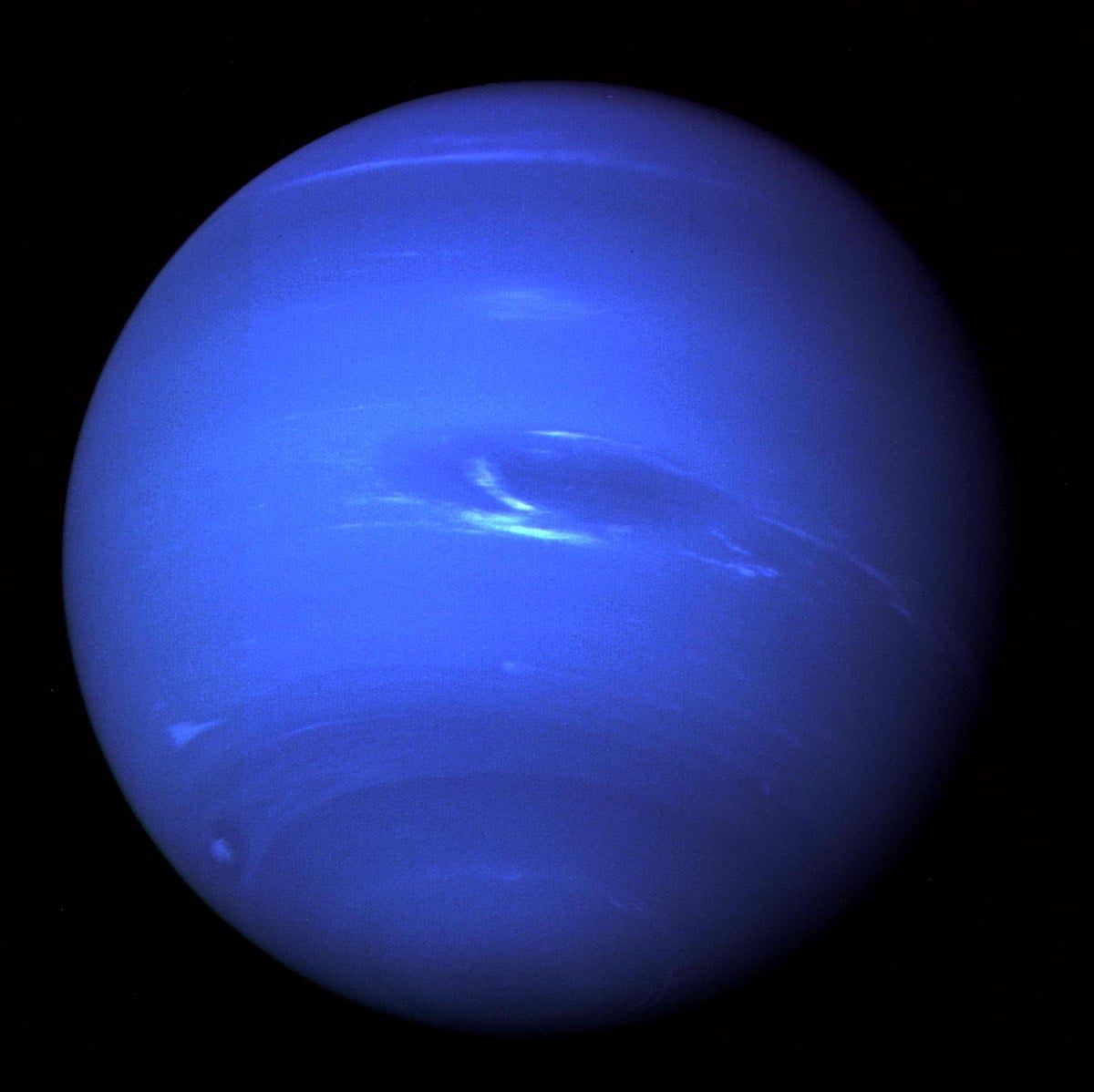 The deep azure atmosphere of Neptune is apparent in this image taken by Voyager 2 in 1989 (Nasa)