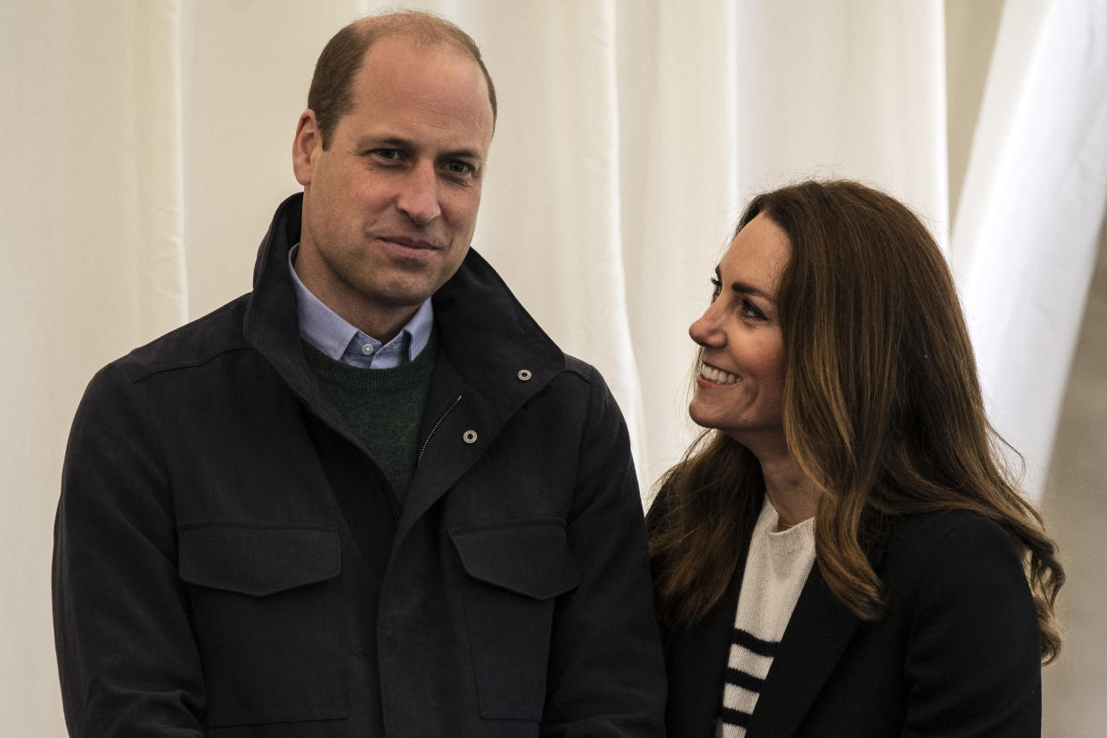 Britain's Catherine, Duchess of Cambridge and Britain's Prince William, Duke of Cambridge meet students as they visit the University of St Andrews in St Andrews on May 26, 2021. (Photo by Andy Buchanan / POOL / AFP) (Photo by ANDY BUCHANAN/POOL/AFP via Getty Images)