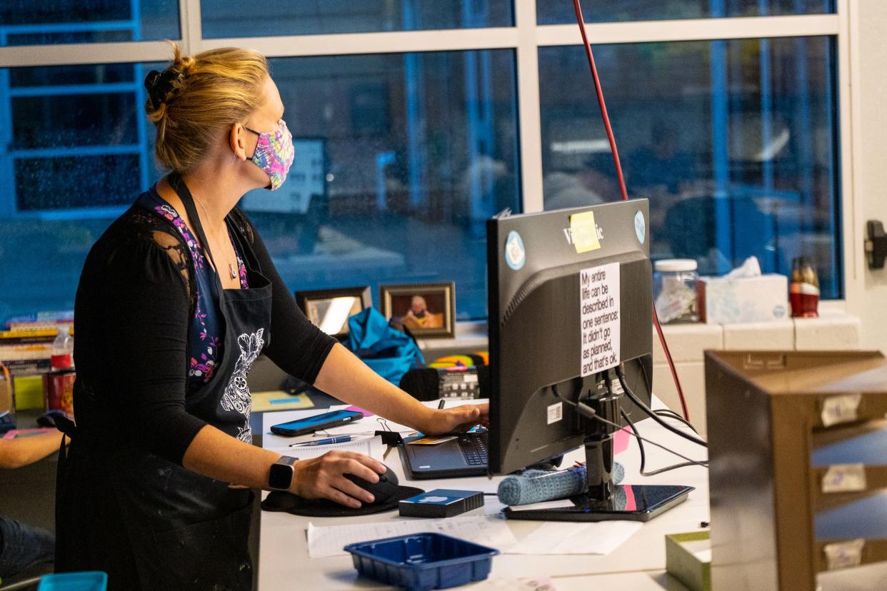 Port Huron Northern art teacher Courtney Werden wears a mask while she leads a class Wednesday, Sept. 22, 2021, at Port Huron Northern High School.