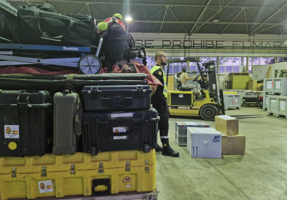 In this photo taken by UME (military emergency unit), rescue material is prepared at the air base in Zaragoza, Spain, Sunday Sept. 10, 2023 to help with the Earthquake rescue in Morocco. Moroccans worked Sunday to rescue survivors of the nation's strongest earthquake in more than a century. (Spanish Defence Ministry, via AP)