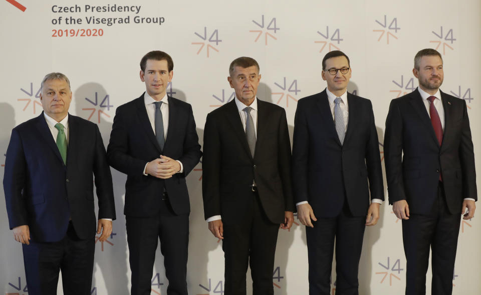 Prime Ministers of Slovakia Peter Pellegrini, right, Poland Mateusz Morawiecki, 2nd right, Czech Republic Andrej Babis, center, Hungary Viktor Orban, left, and Austria's Chancellor Sebastian Kurz, 2nd left, pose for a photo as they meet at the National Museum in Prague, Czech Republic, Thursday, Jan. 16, 2020. (AP Photo/Petr David Josek)