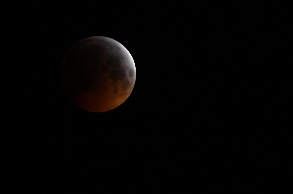 The "super blood wolf moon" is seen during a total lunar eclipse in Stockholm, Sweden, January 21, 2019. TT News Agency/Jonas Ekstroemer via REUTERS ATTENTION EDITORS - THIS IMAGE WAS PROVIDED BY A THIRD PARTY. SWEDEN OUT.