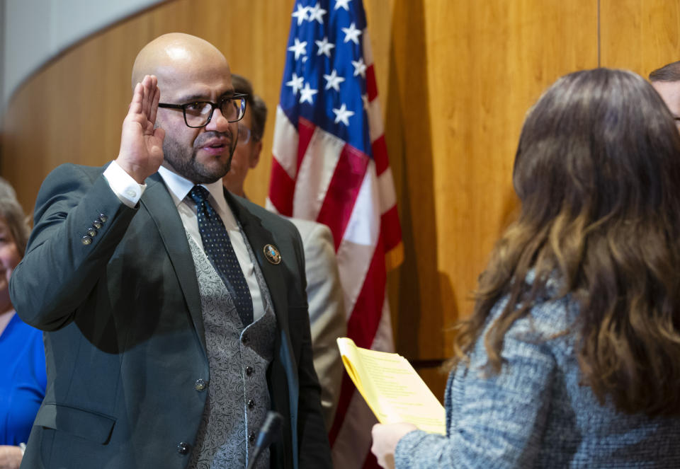 New Mexico State Rep. Javier Martinez, D-Albuquerque, is sworn in as the new Speaker of the House during the opening day of an annual legislative session in the House of Representatives in Santa Fe, N.M., on Tuesday, Jan. 17, 2023. (AP Photo/Andres Leighton)