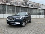 <p>The current Volvo XC90 has been in production since late 2014, though you wouldn't know it by driving it. </p><p>The Swedish carmaker's three-row SUV remains one of the most pleasant, classy options in the luxury segment. The looks haven't really evolved, but it's better that way. The design is the opposite of busy, yet still easily recognizable as a Volvo. </p><p>The plug-in hybrid drivetrain brings the rest of the car into the modern age, with over 30 miles of pure electric range and an impressive combined EPA rating of 66 MPGe. There are a few things that could be improved upon, however, like the sudden surge of torque that arrives when the car goes from pure EV to hybrid mode. There's also the braking, which can be a bit finicky at low speeds as it tries to recoup as much energy as possible. </p><p>That stuff mostly goes out the window when you mash the throttle pedal, as the XC90 Recharge is seriously quick in a straight line. That hybrid drivetrain delivers 455 hp and 523 lb-ft of torque, allowing for a 0-60 time of just 4.5 seconds. That's real sports car speed. </p><p>Despite its age, the interior still stands out as one of the best in the business. The dash and center console are minimalistic yet easy to use, while the seats are downright perfect. We're especially big fans of the wool blend upholstery—proof that not every luxury car has to use leather to feel upscale. </p><p>Factor in the comfortable four-corner air suspension, smooth steering, ample cargo space, and sub-$80,000 base price, and the XC90 remains a solid choice in the three-row luxury SUV segment. </p>