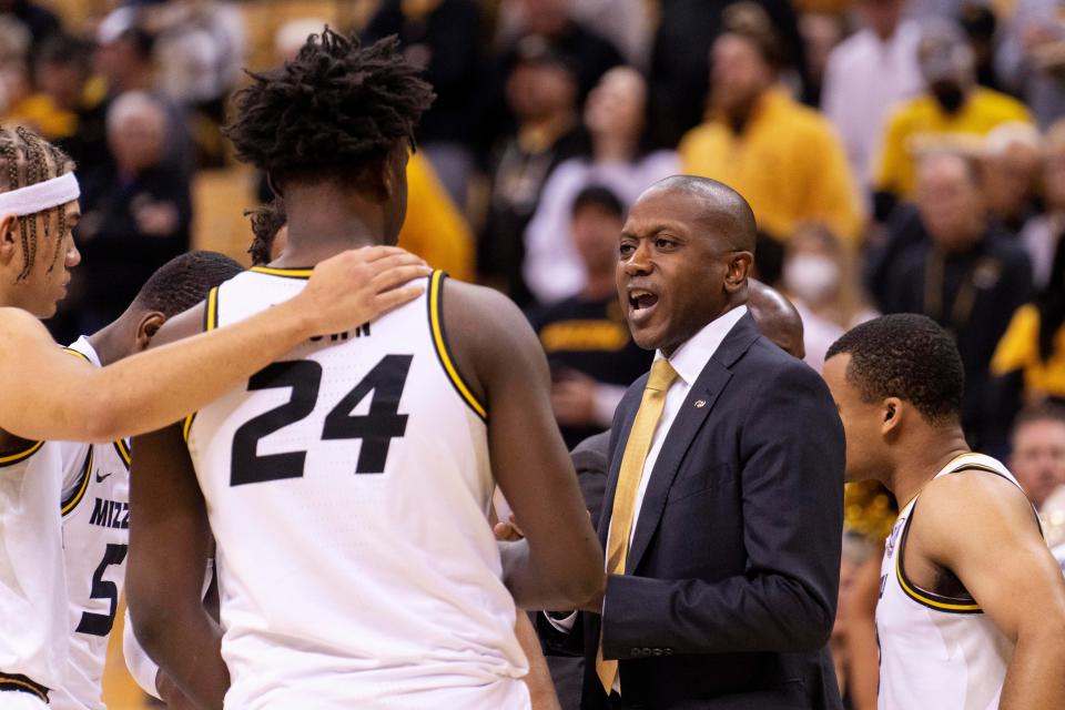 Missouri head coach Dennis Gates talks to his players during a timeout in the first half of an NCAA college basketball game against SIU-Edwardsville Tuesday, Nov. 15, 2022, in Columbia, Mo.