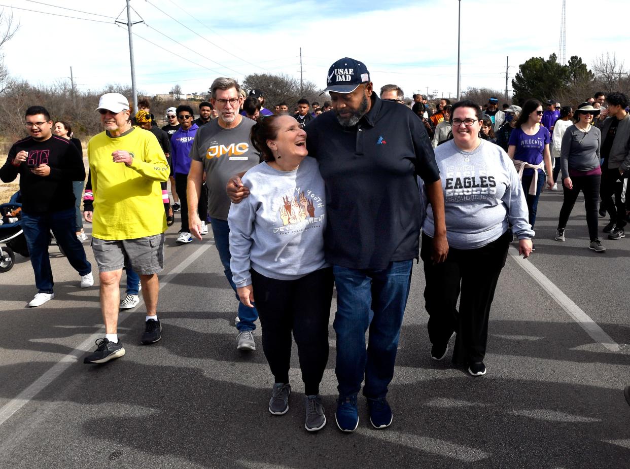 Janet Mendenhall laughs as she walks with Abilene Mayor Anthony Williams during Monday's Martin Luther King Jr. March Jan. 16. This was Williams' final MLK march as Abilene's first Black mayor.