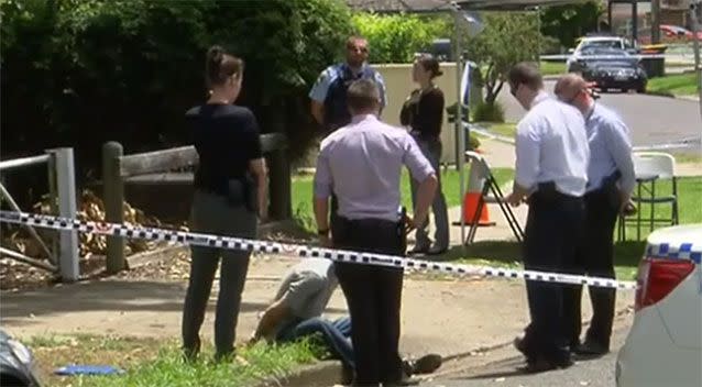 A distressed son of the victim confronted police close to where his mother was murdered. Photo: 7 News