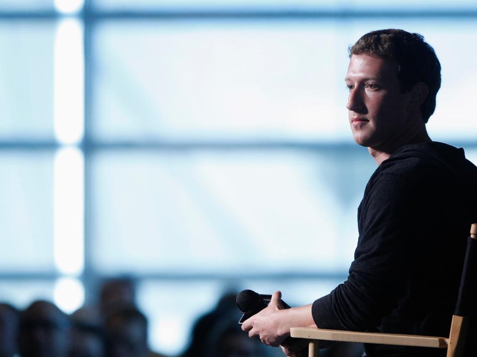 Photo of Mark Zuckerberg sitting pensively at a conference.