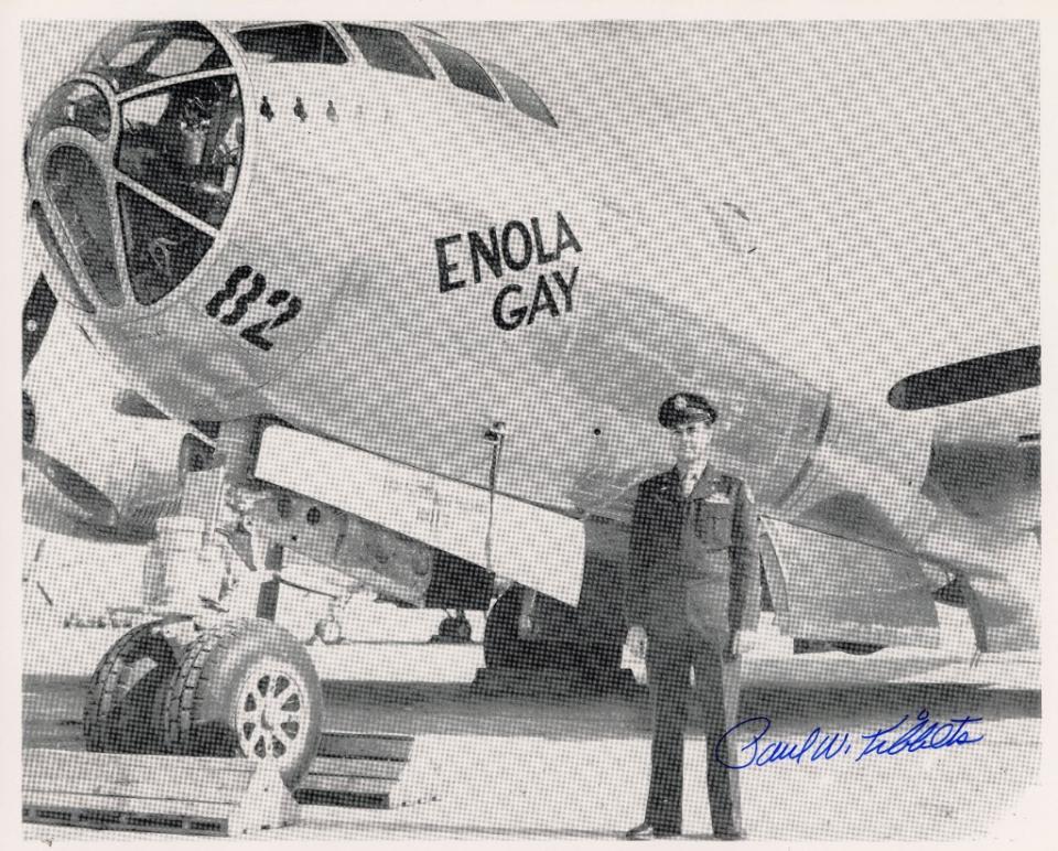 Autographed photo of Paul Tibbets posing in front of the Enola Gay, a B-29 Superfortress heavy bomber. Tibbets was a brigadier general in the U.S. Air Force, and he piloted the Enola Gay during the August 6 drop of the Little Boy weapon over Hiroshima, Japan. Manhattan Project National Historical Park