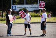 Workers picket outside a General Motors facility in Langhorne, Pa., Monday, Sept. 23, 2019. The strike against General Motors by 49,000 United Auto Workers entered its second week Monday with progress reported in negotiations but no clear end in sight. (AP Photo/Matt Rourke)