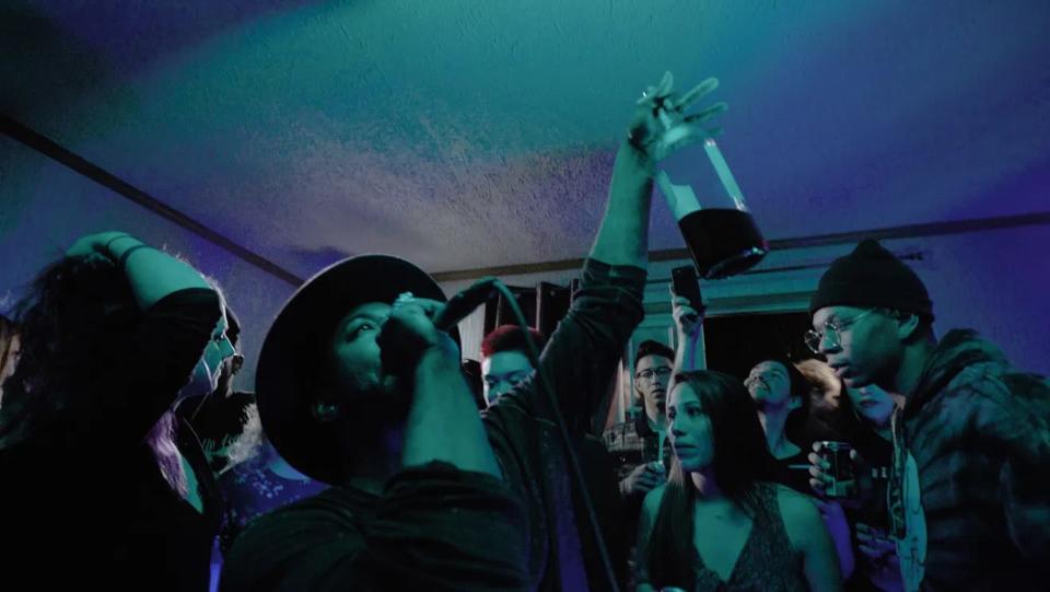 This still from the 2018 documentary film "Athens Rising" shows a performance at Murder House, the Athens artist residence where Volumes Hip Hop originated.