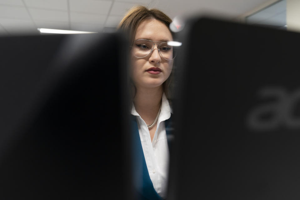 Kateryna Stepanenko, a Russia Analyst, works as her desk at the Institute for the Study of War, Wednesday, Jan. 11, 2023, in Washington. (AP Photo/Alex Brandon)