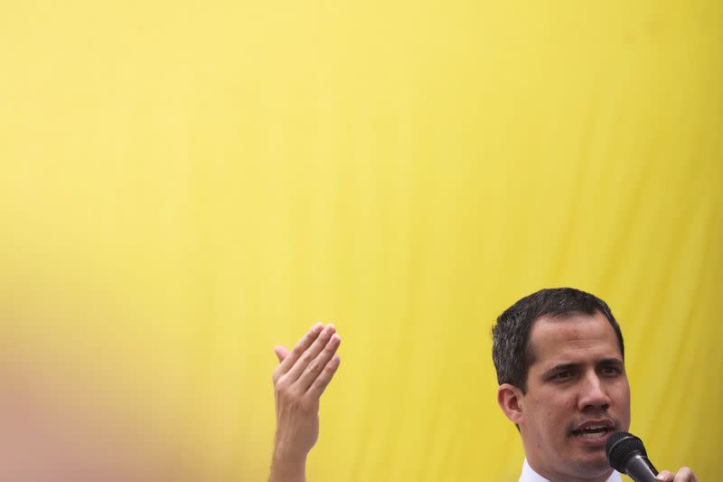 Venezuela's National Assembly President and opposition leader Juan Guaido, who many nations have recognised as the country's rightful interim ruler, gestures as he speaks during a demonstration in Caracas