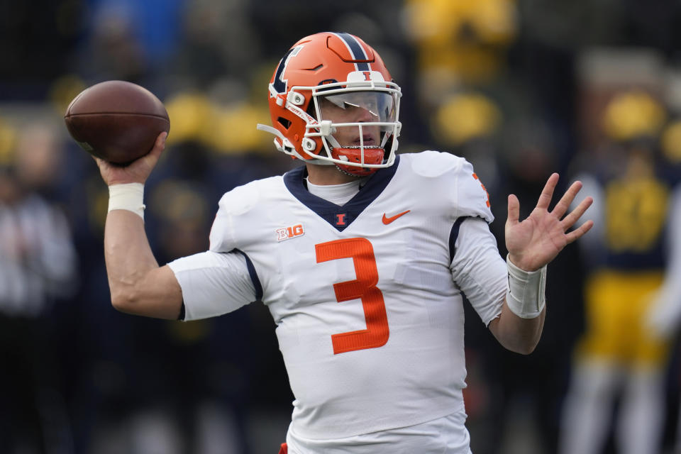 Illinois quarterback Tommy DeVito (3) throws against Michigan in the second half of an NCAA college football game in Ann Arbor, Mich., Saturday, Nov. 19, 2022. (AP Photo/Paul Sancya)