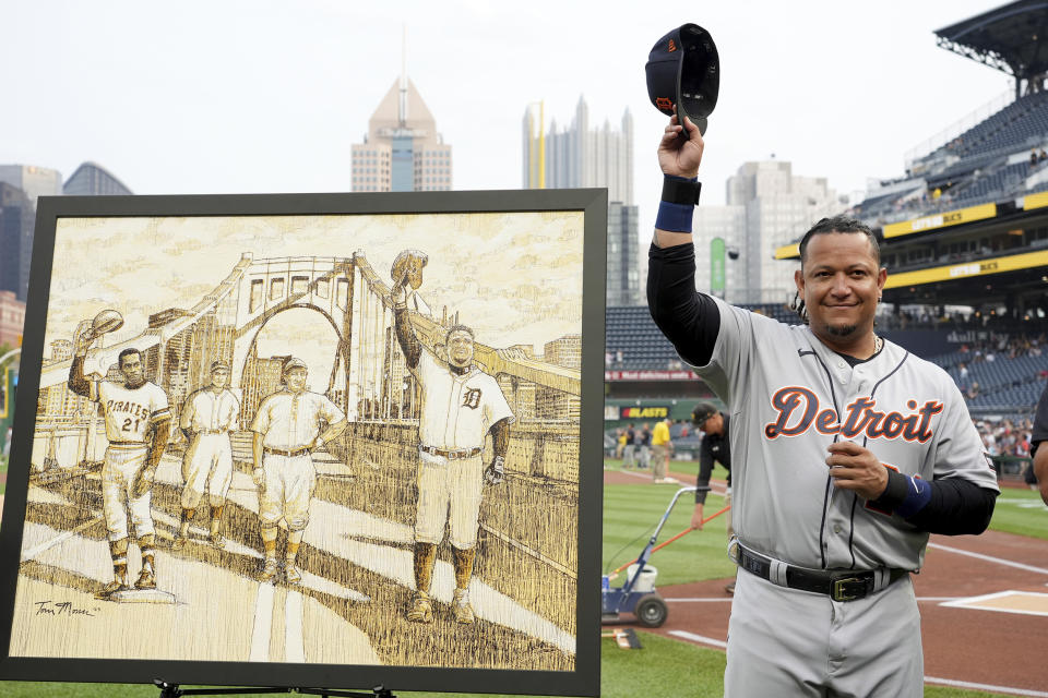 Detroit Tigers' Miguel Cabrera acknowledges the crowd after receiving a painting during a pre-game ceremony celebrating his career before a baseball game against the Pittsburgh Pirates in Pittsburgh, Tuesday, Aug. 1, 2023. (AP Photo/Matt Freed)