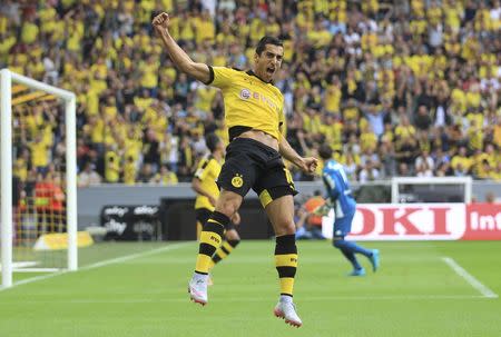 Borussia Dortmund's Henrikh Mkhitaryan celebrates a goal against Borussia Moenchengladbach during their Bundesliga first division soccer match in Gelsenkirchen, Germany August 15, 2015. REUTERS/Ina Fassbender