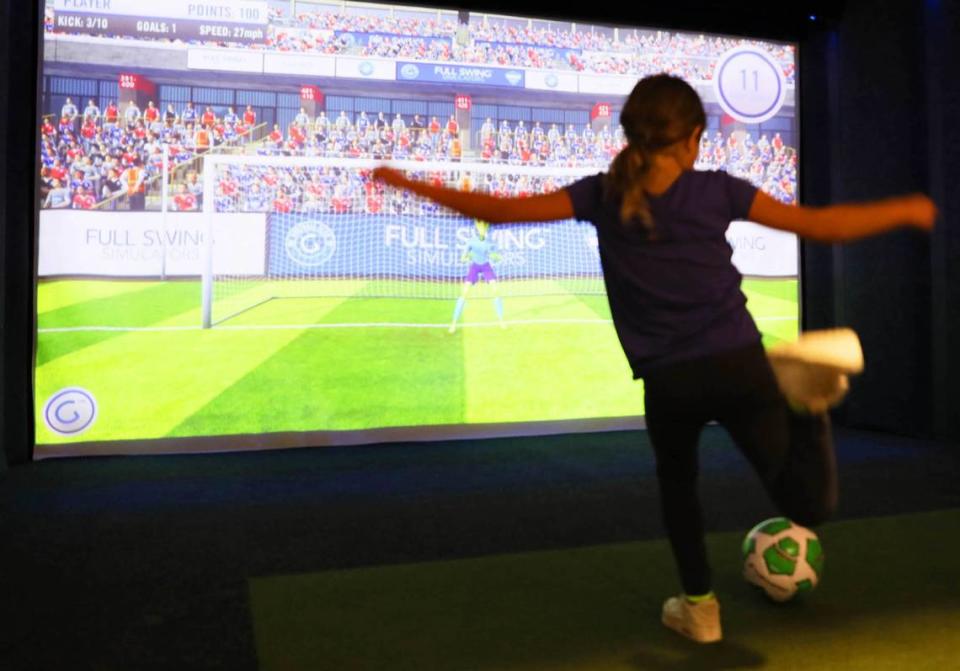 A visitor plays simulated soccer at the new Elevate children’s area at the Black Oak Casino Resort in Tuolumne County CA. It opened in December 2023.