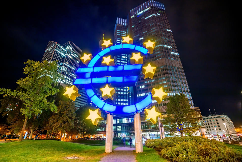 Business district in Frankfurt am Main with giant Euro sign, Germany.