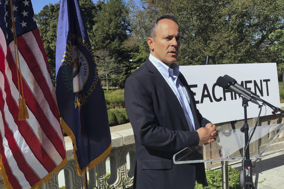 In this Oct. 4, 2019 photo, Kentucky Governor Matt Bevin condemns the impeachment inquiry against President Donald Trump while speaking with reporters outside the Governor's Mansion in Frankfort, Ky. (AP Photo/Bruce Schreiner)