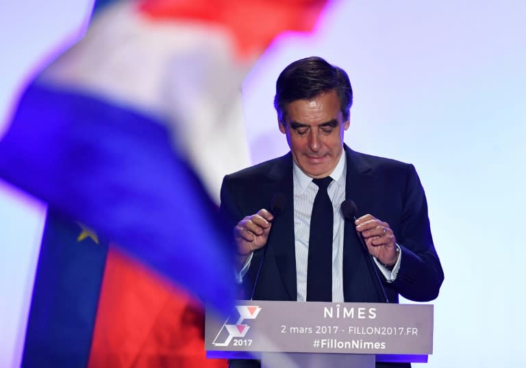 French presidential election candidate Francois Fillon, whose Paris home was raided by police, is going ahead with plans to hold a rally near the Eiffel Tower