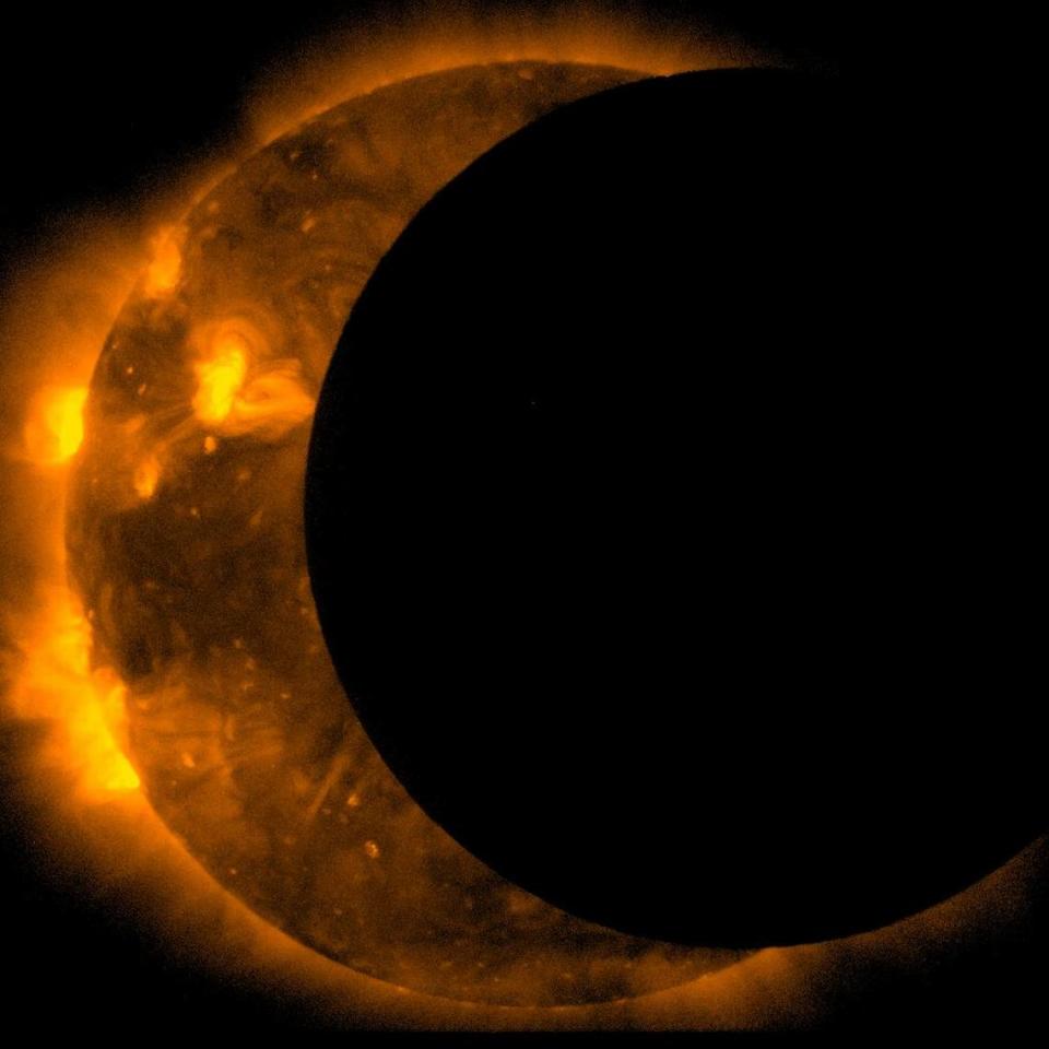 The joint JAXA/NASA Hinode mission captured these images of an annular eclipse of the Sun on May 20, 2012.  During an annular eclipse the moon does not block the entirety of the sun, but leaves a bright ring of light visible at the edges. For the May eclipse, the moon was at the furthest distance from Earth that it ever achieves – meaning that it blocked the smallest possible portion of the sun, and leaves the largest possible bright ring around the outside.  Scientists often use an eclipse to help calibrate the instruments on the telescope by focusing in on the edge of the moon as it crosses the sun and measuring how sharp it appears in the images. Photo shared via Wikimedia Commons. 