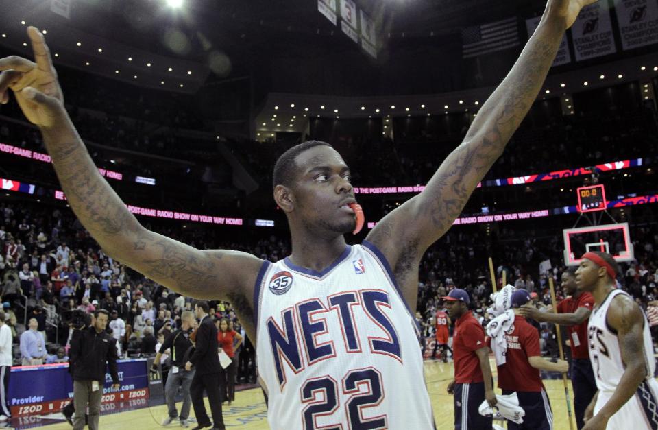 New Jersey Nets' Anthony Morrow gestures to the crowd as he leaves the court at the end of an NBA basketball game against the Philadelphia 76ers, Monday, April 23, 2012, in Newark, N.J. The 76ers won 105-87. The Nets, who played their last regular season home game, will pack up and move to Brooklyn. (AP Photo/Julio Cortez)