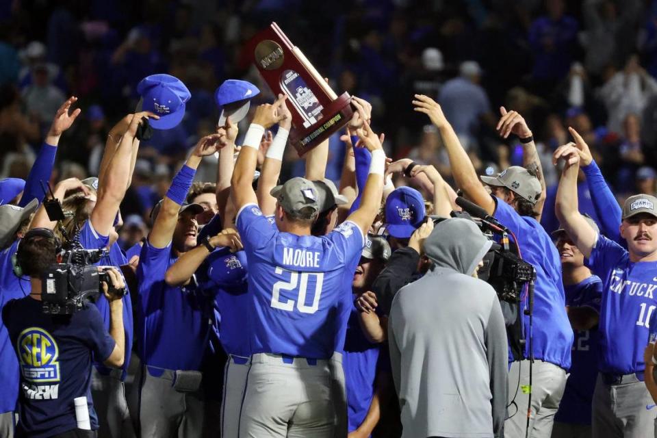 Kentucky players celebrate after defeating Oregon State to reach the College World Series for the first time in program history.