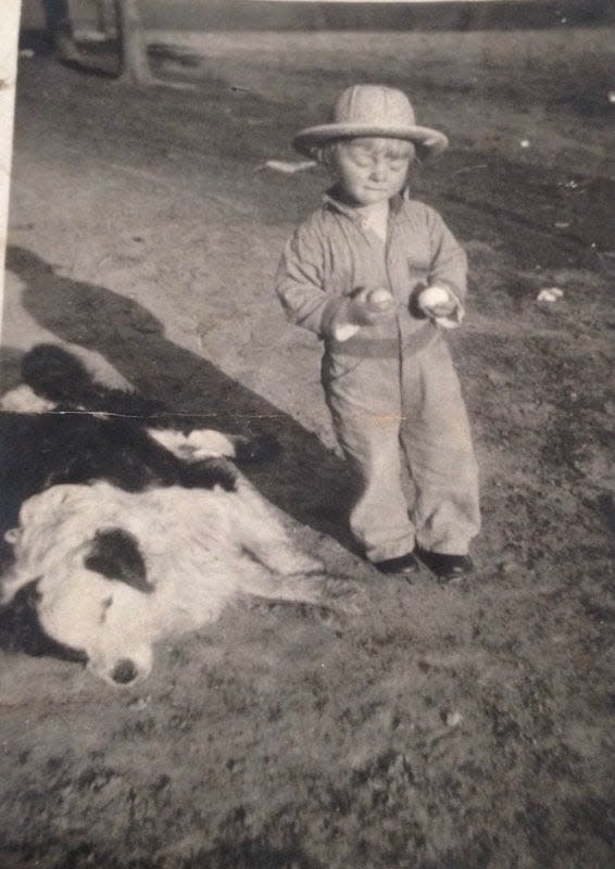 William with his shepherd dog, Jack, sometime in the late 1920s in Baroda, Michigan.