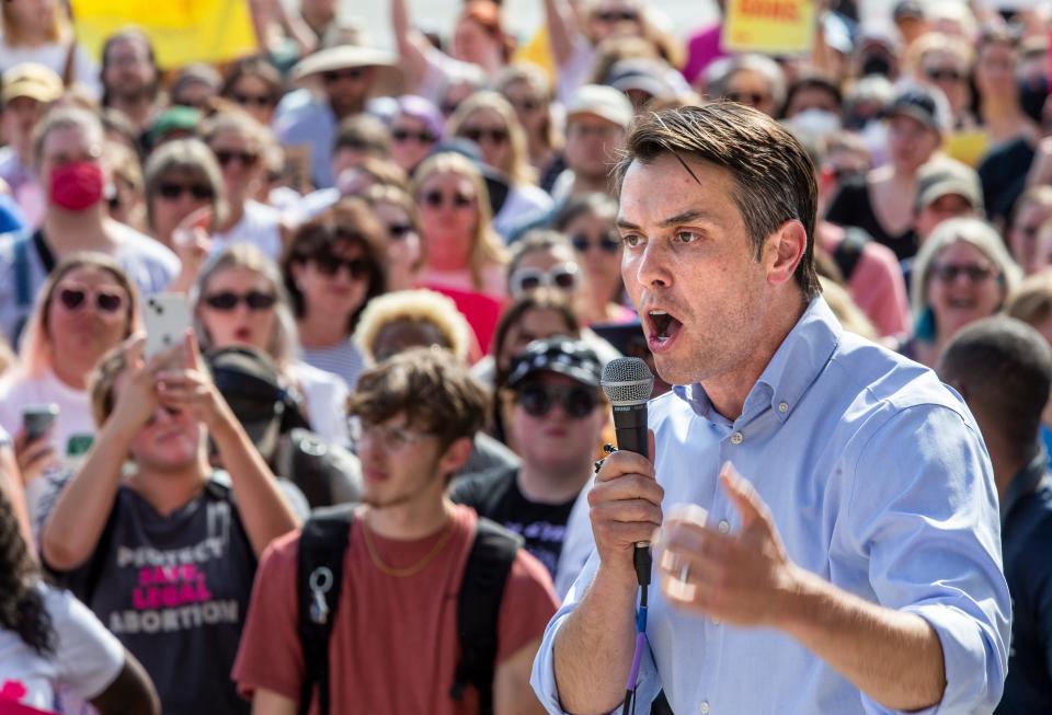 Protesters converged on the Federal Building in Louisville to protest the Supreme Court's decision to strike down the Roe vs Wade decision and the right to an abortion. Kentucky State Senator Morgan McGarvey spoke to the throng of people at the rally. June 24, 2022